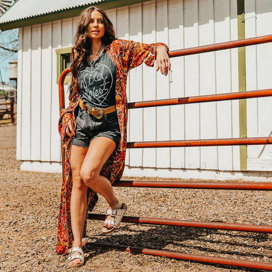 FREEBIRD women's Asher bone sandal with adjustable belt buckles, a suede footbed and silver embellishments lifestyle