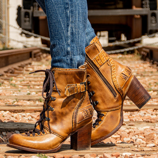 Freebird women's BANKS tan multi leather bootie with an inside working brass zipper, a tall heel and front lace up closure