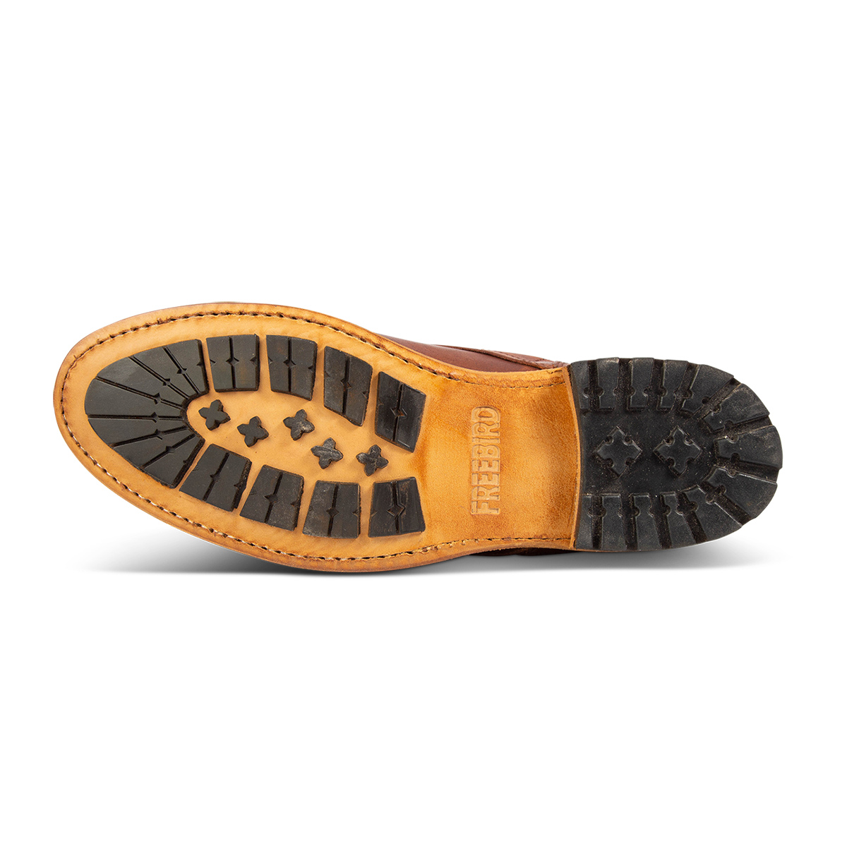 Rubber sole imprinted with FREEBIRD on men's benning cognac leather boot