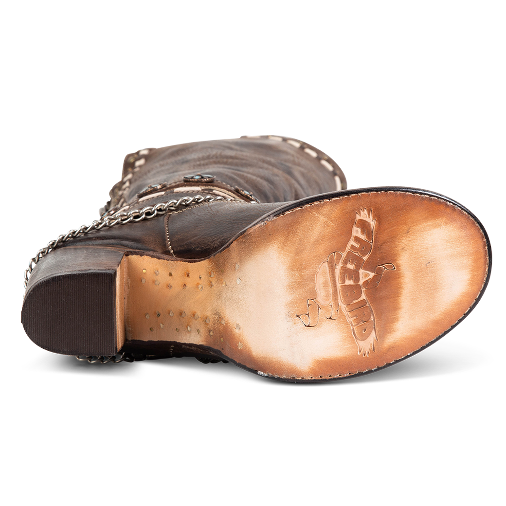 Tan leather sole imprinted with FREEBIRD on women's Blakely brown boot