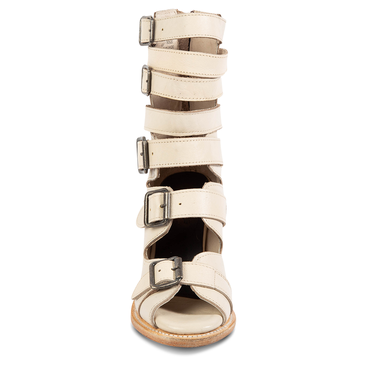 Front view showing buckle cut outs and leather fashion straps on FREEBIRD women's Bond off white sandal 