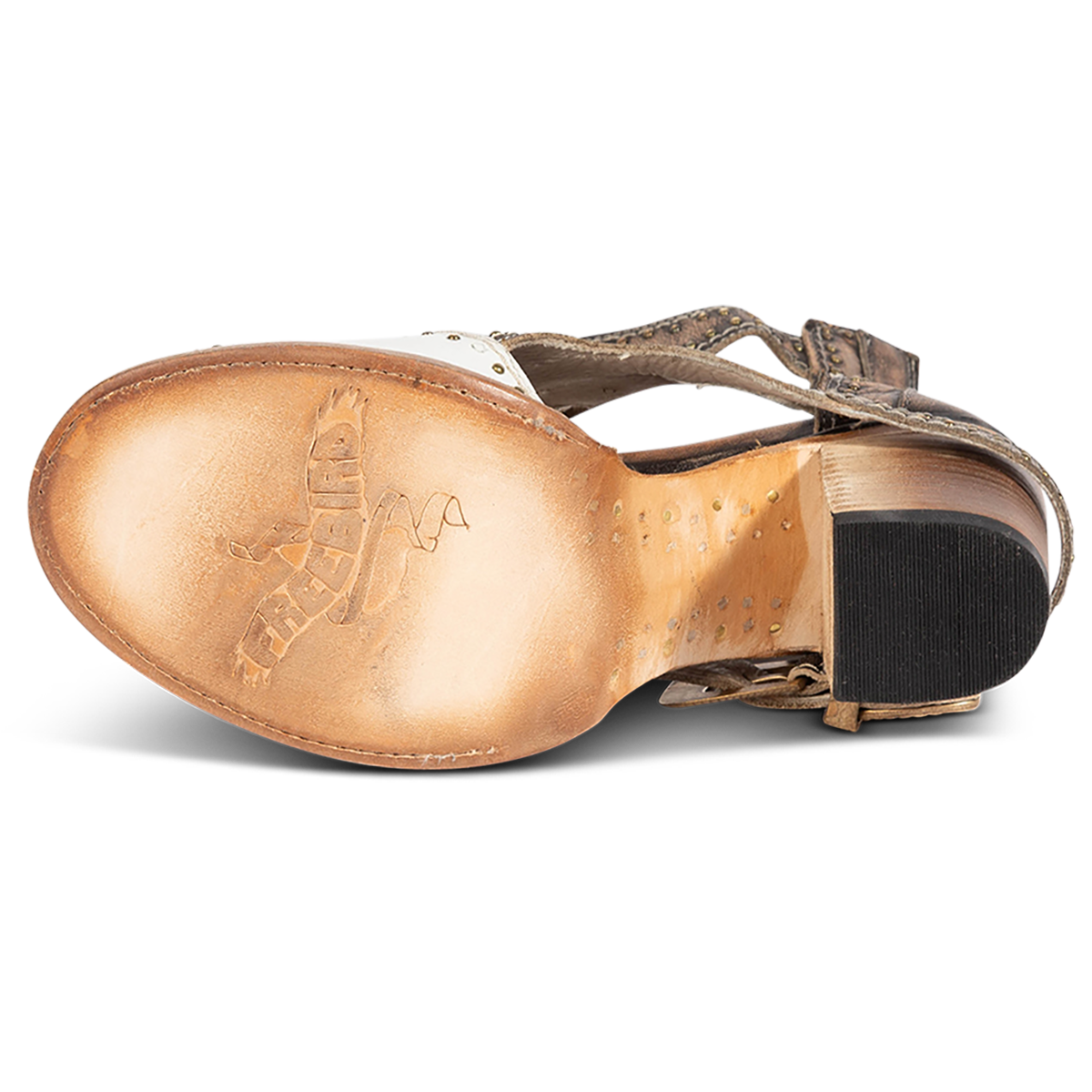 Leather sole imprinted with FREEBIRD on women's Bradshaw white/gold two-toned leather sandal
