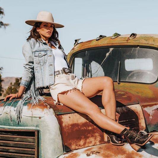 FREEBIRD women's Braeden black multi sandal with adjustable straps and leather lacing detailing lifestyle image