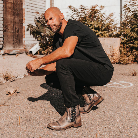 FREEBIRD men's Brooks black leather boot featuring side shaft lacing, leather sole and low block heel lifestyle image