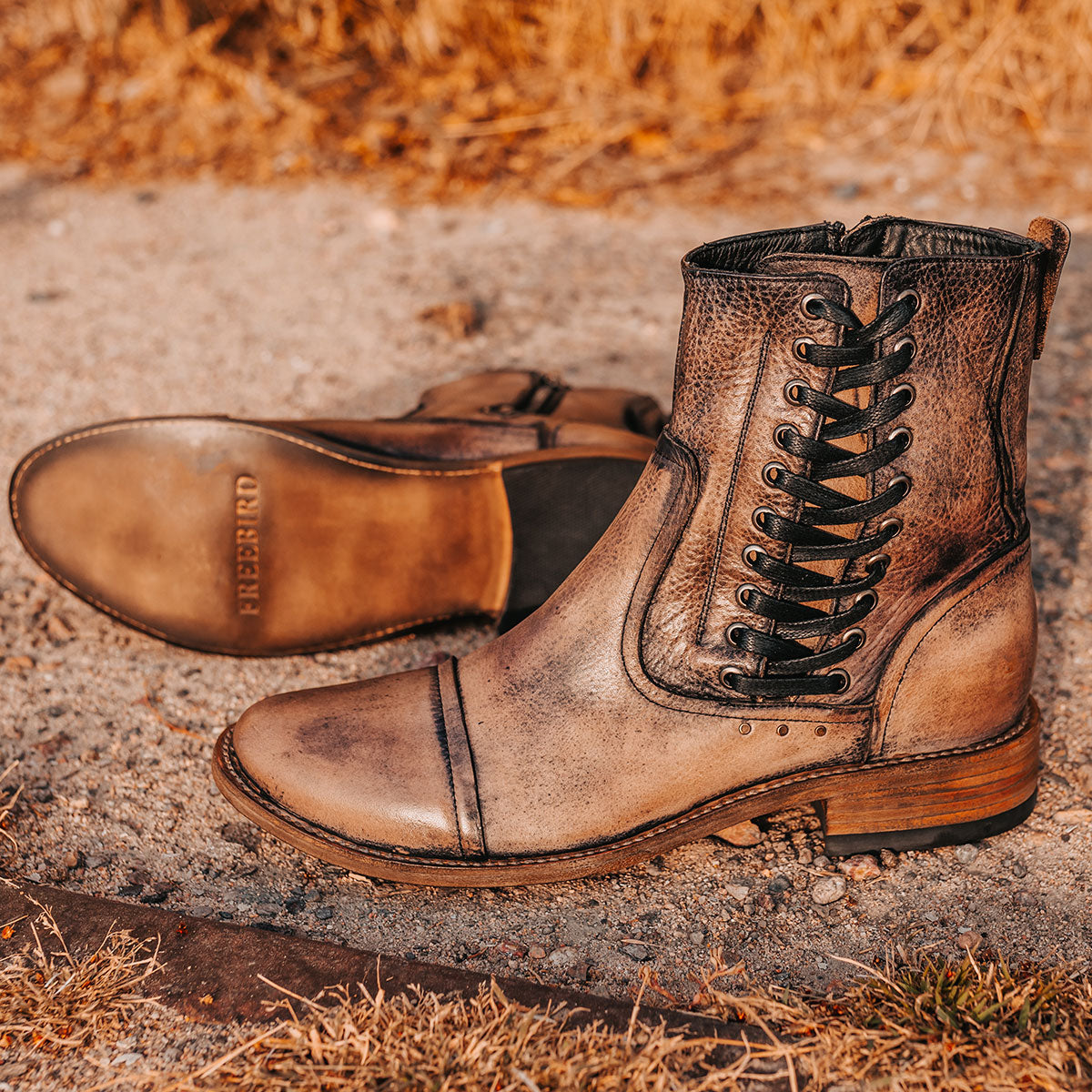 FREEBIRD men's Brooks black leather boot featuring side shaft lacing, leather sole and low block heel