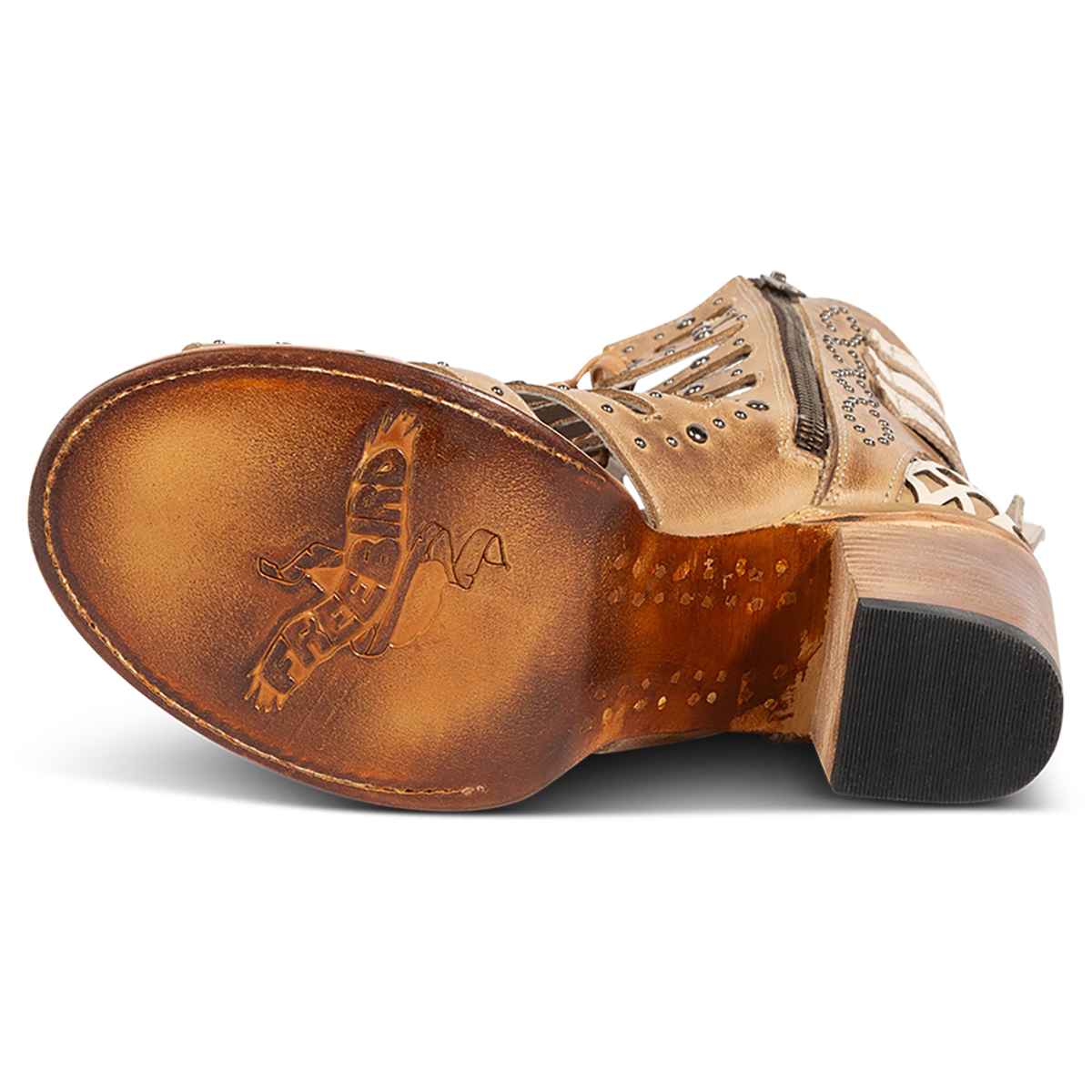 Leather sole imprinted with FREEBIRD on women's BUD tan leather sandal
