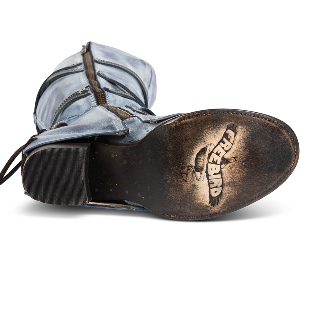 Leather sole imprinted with FREEBIRD on women's Cassius blue leather tall wrap boot