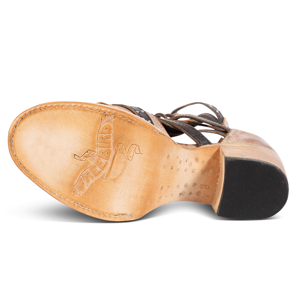 Leather sole imprinted with FREEBIRD on women's Cheyenne taupe multi bootie