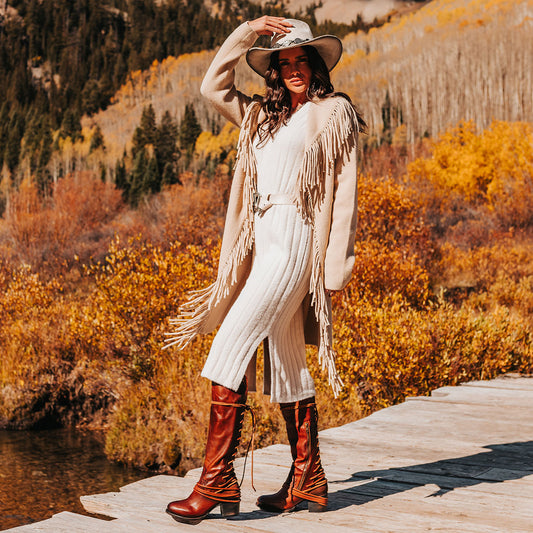 FREEBIRD women’s Coal cognac leather knee high adjustable back lacing boot lifestyle image