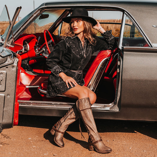 FREEBIRD women’s Coal stone leather knee high adjustable back lacing boot lifestyle image