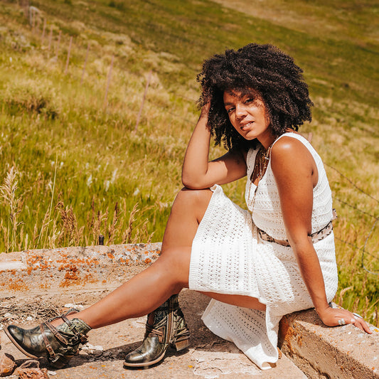 CRUE Olive Multi leather backlace booties with snake-print collar, decorative buckled straps, and side zippers lifestyle