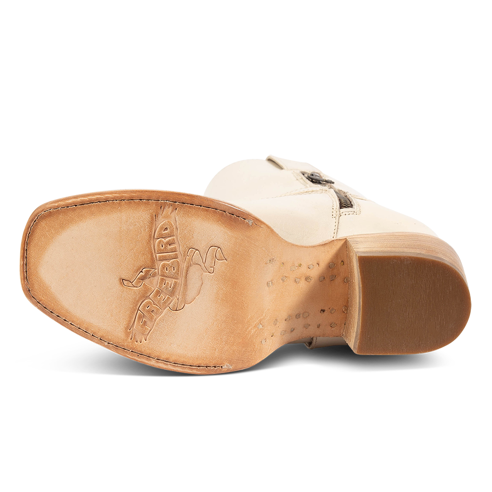 Leather sole imprinted with FREEBIRD on women's Darcy beige leather boot