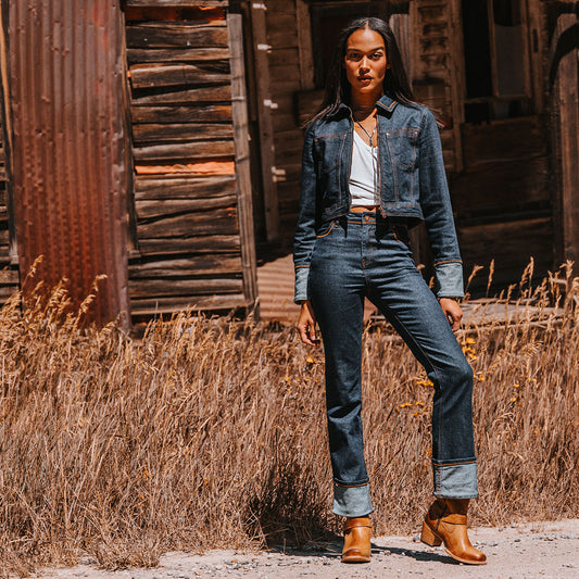 FREEBIRD women's Darcy wheat leather boot with a studded ankle harness, leather pull straps, an inside zip closure and a square toe lifestyle image