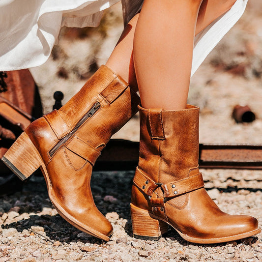 FREEBIRD women's Darcy wheat leather boot with a studded ankle harness, leather pull straps, an inside zip closure and a square toe