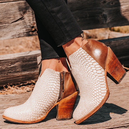 FREEBIRD women's Detroit white snake featuring inverted heel, front cut out dip, and two toned full grain leather