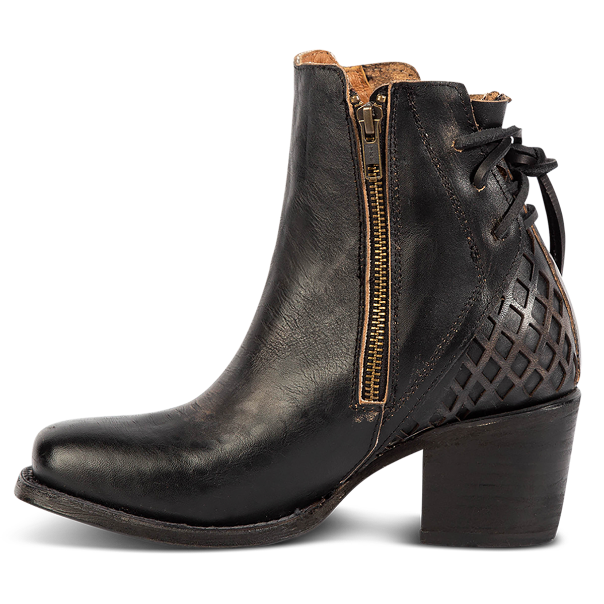 Inside view showing working brass zipper, laser cut detailing, and a stacked heel on FREEBIRD women's Dreamer black leather bootie 