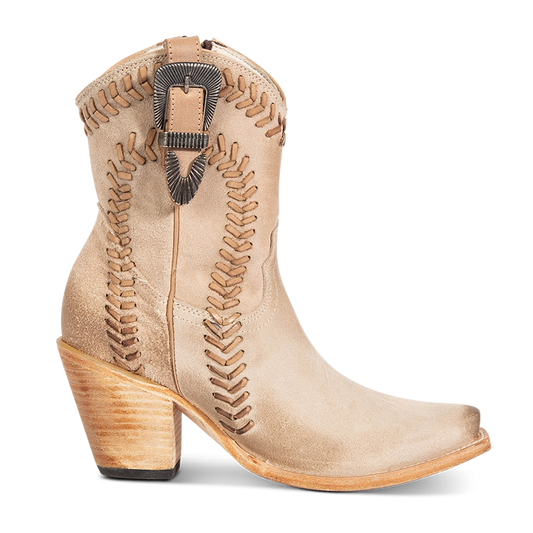 FREEBIRD women's Freya beige suede bootie with whip stitch detailing, a snip toe silhouette and decorative vintage buckle. Finished with an inside working zipper.