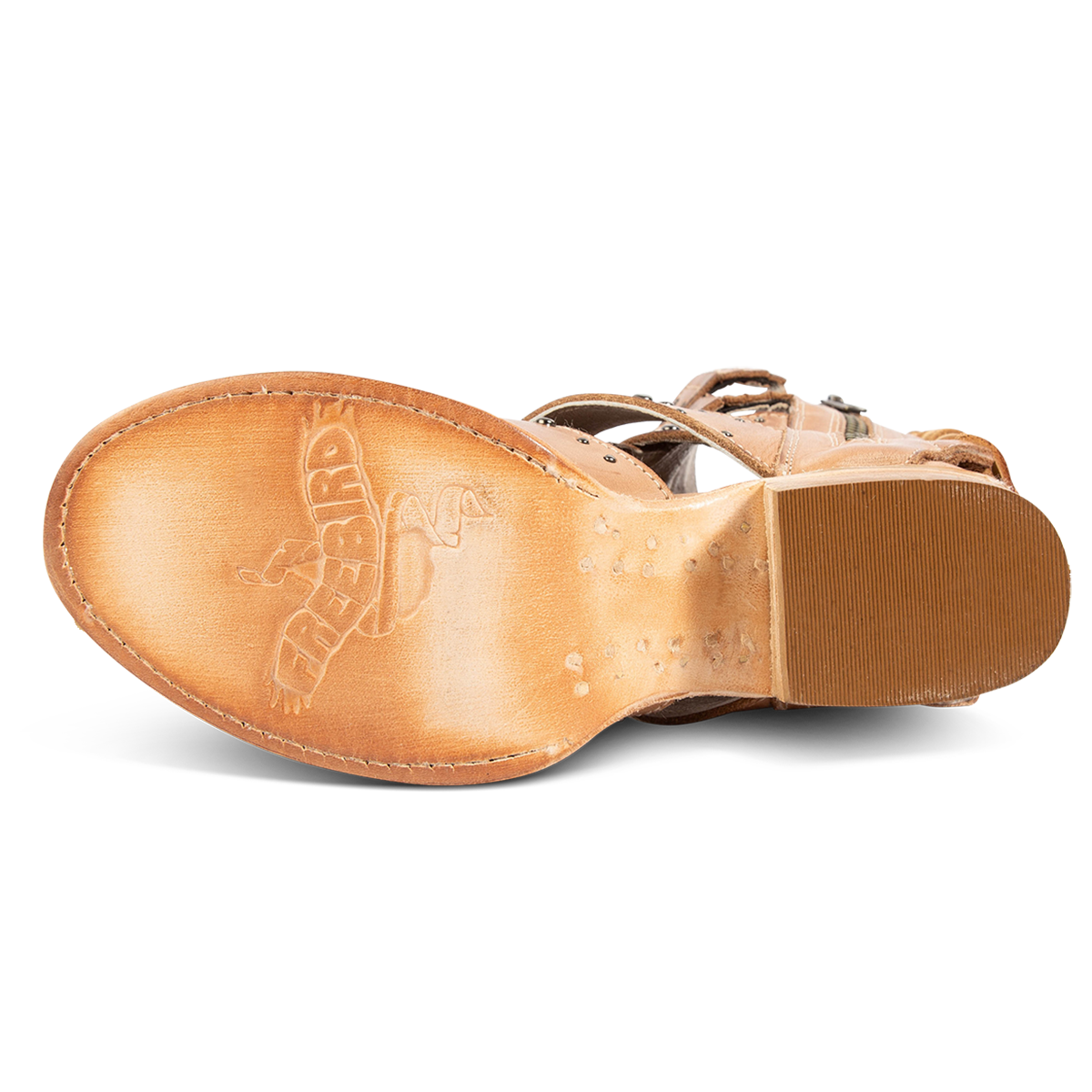 Leather sole imprinted with FREEBIRD on women's Ghost natural leather sandal