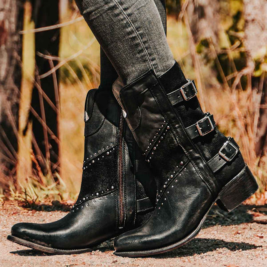 Freebird women's GOLDIE black suede and leather boot with stud embellishments, front shin cut out and adjustable buckle straps around the calf
