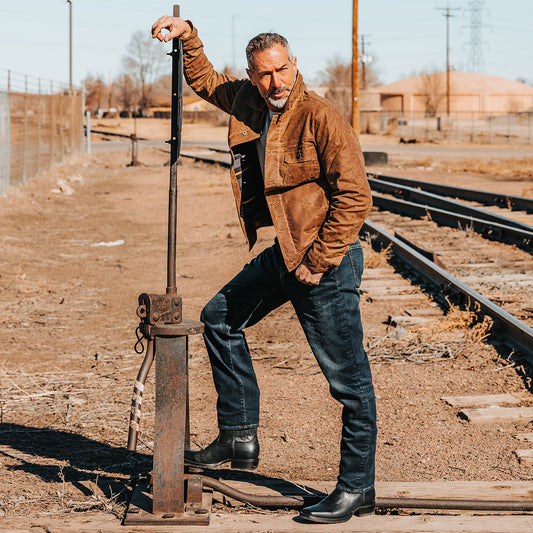 FREEBIRD men's Heritage black leather boot with square toe construction, leather pull straps and tread sole lifestyle image