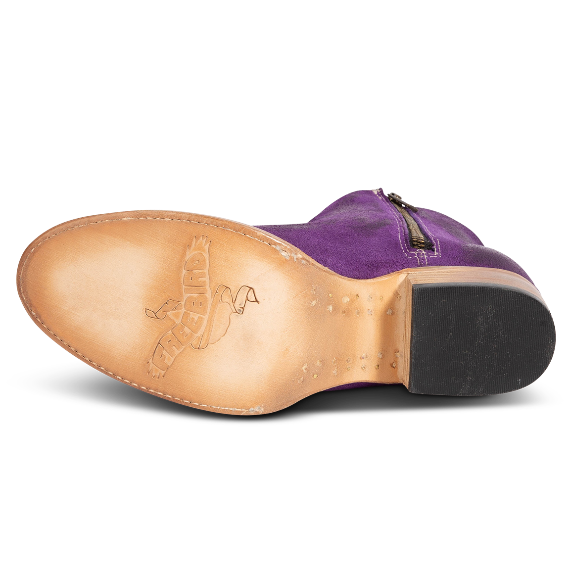 Leather sole imprinted with FREEBIRD on women's Hippy purple suede bootie