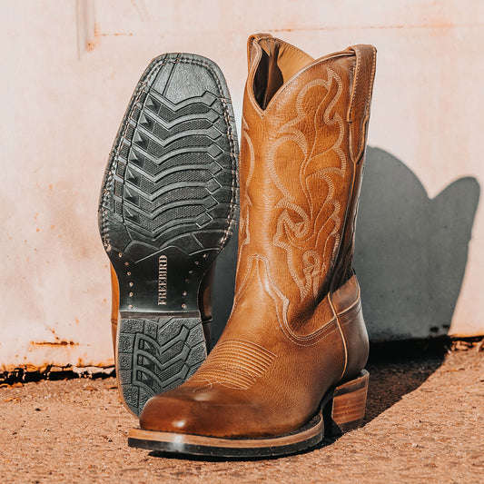FREEBIRD men's James banana leather boot with traditional Western stitching, tread sole and leather pull straps