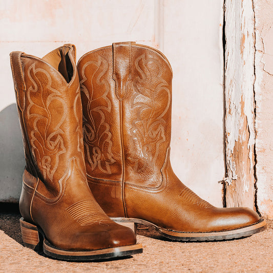 FREEBIRD men's James banana leather boot with traditional Western stitching, tread sole and leather pull straps