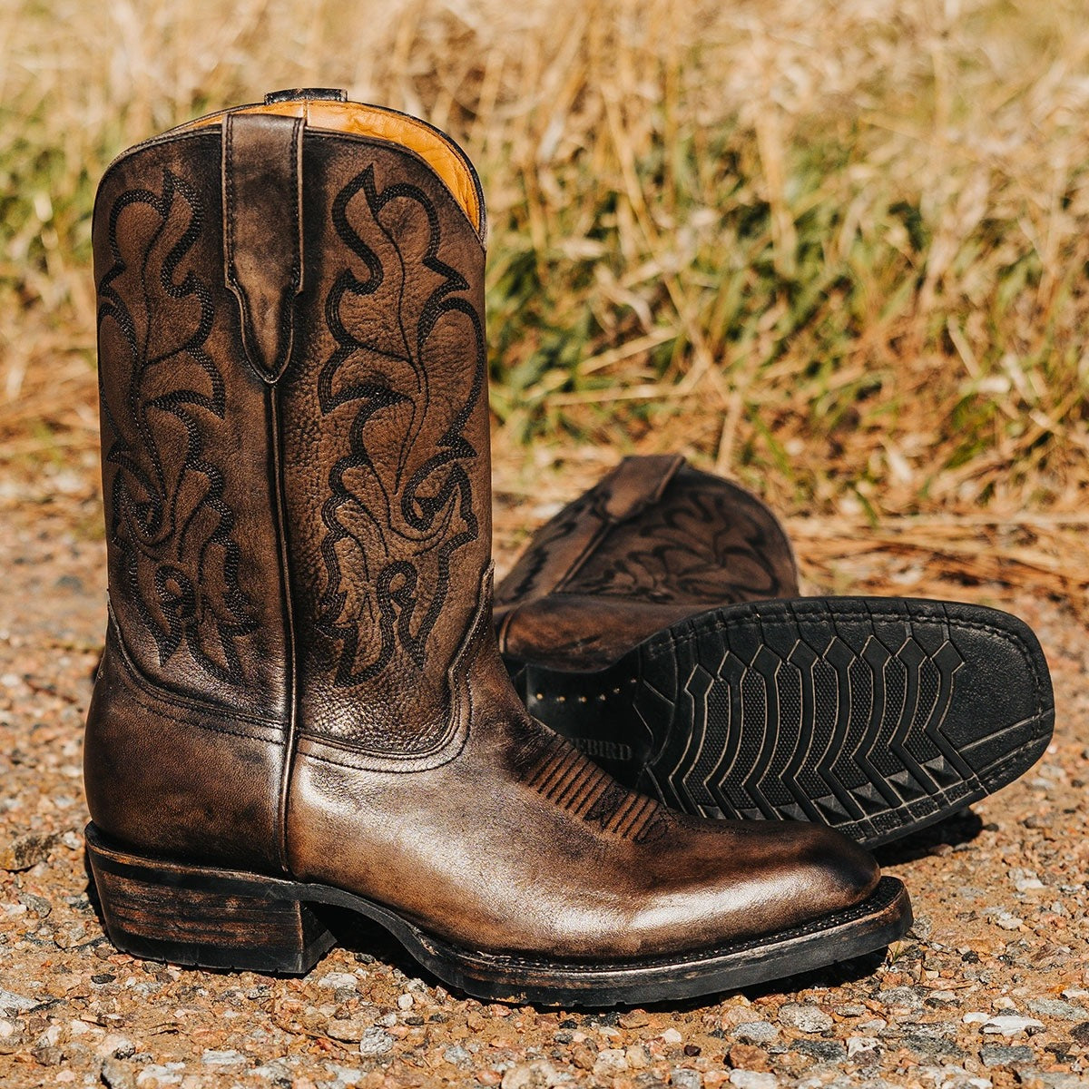 FREEBIRD men's James grey distressed leather boot with traditional Western stitching, tread sole and leather pull straps