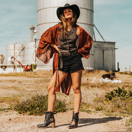 FREEBIRD women's Jetson black western heeled bootie with vintage-inspired detailing and instep cutout lifestyle image