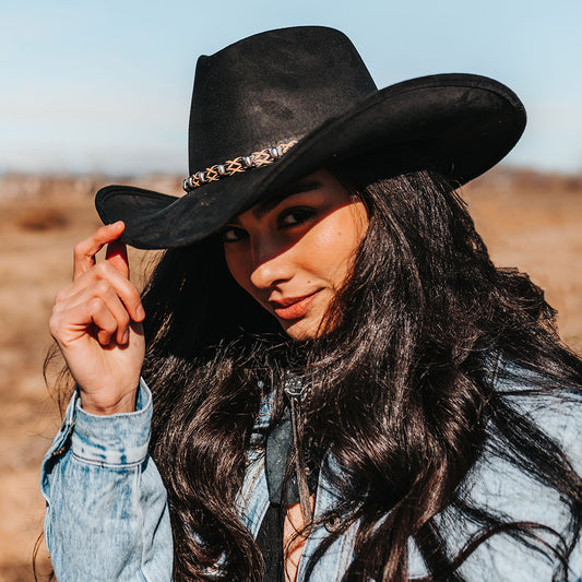 FREEBIRD Jones black western cowboy hat featuring teardrop crown, upturned-brim, and braided leather band lifestyle