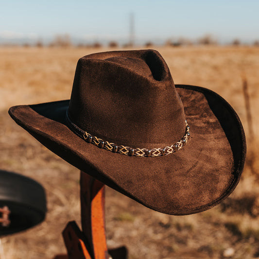 FREEBIRD Jones beige western cowboy hat featuring teardrop crown, upturned-brim, and braided leather band