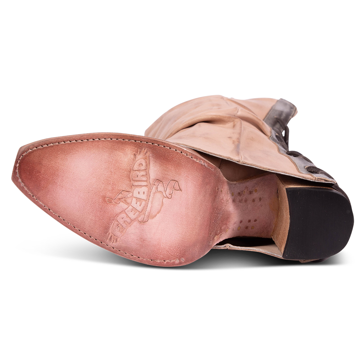 Leather sole imprinted with FREEBIRD on women's Jules blush leather high flare heel western boot