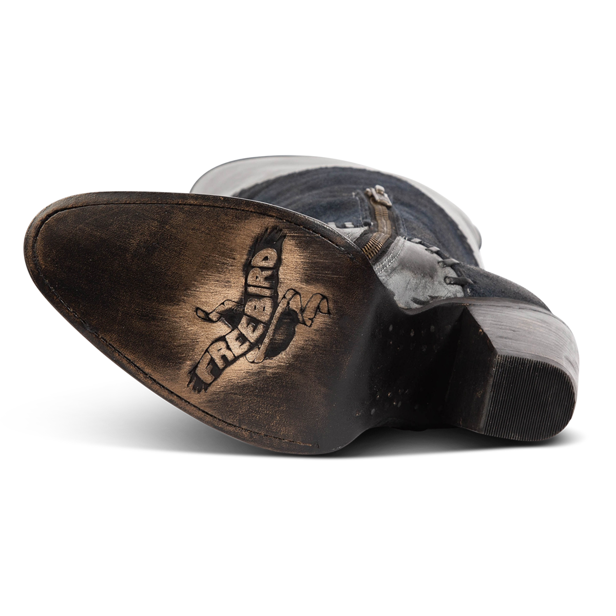 Leather sole imprinted with FREEBIRD on women's Junie blue suede and solid leather boot