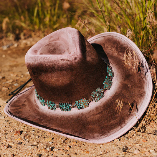 FREEBIRD Lasso pink distressed western hat featuring teardrop crown, upturned-brim, and turquoise metal band