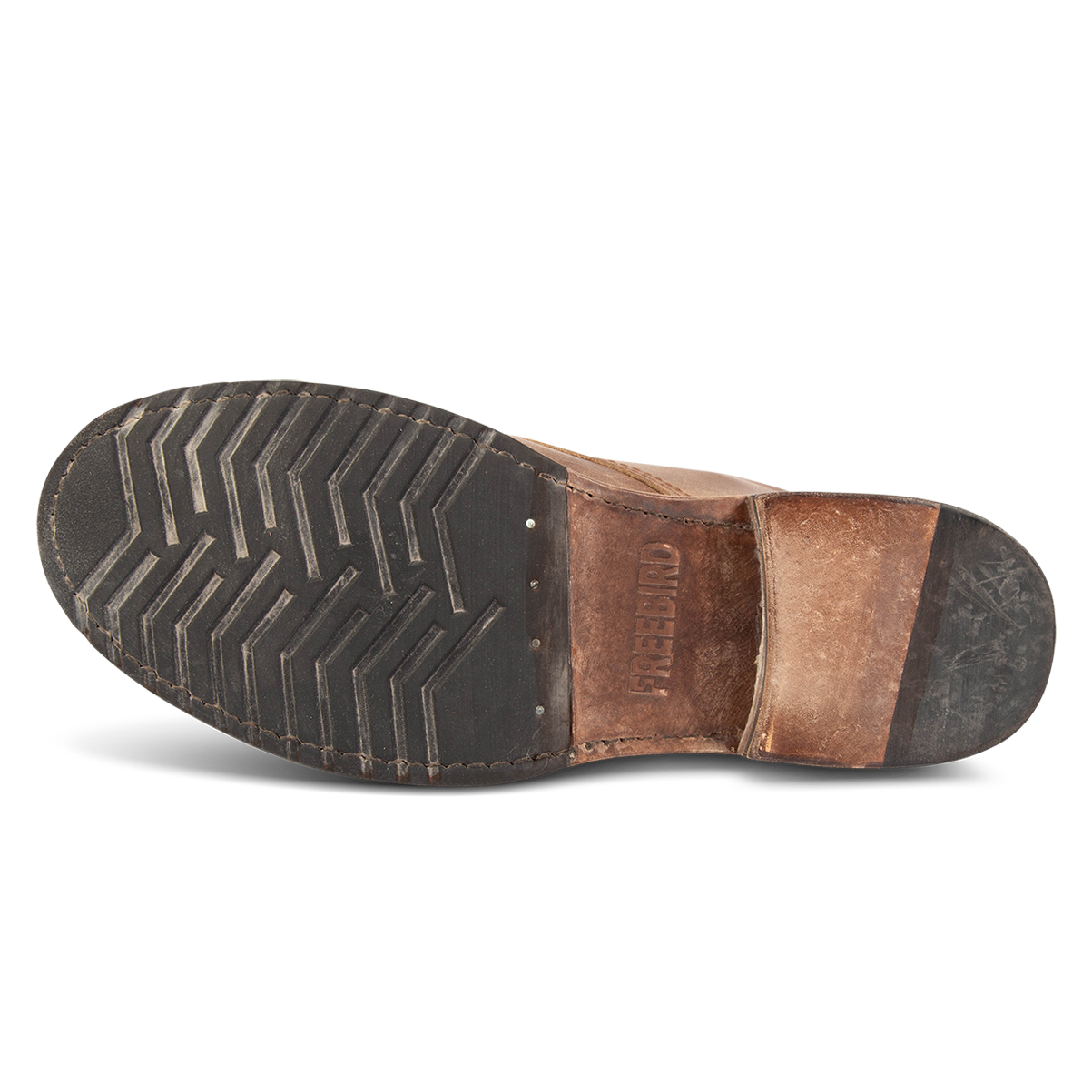 Rubber and leather sole imprinted with FREEBIRD on men's Leavenworth brown distressed leather boot