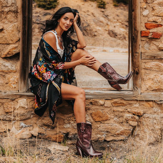 FREEBIRD women's Loretta wine leather boot with a tooled 100% full grain shaft, inside zip closure and inverted heel lifestyle