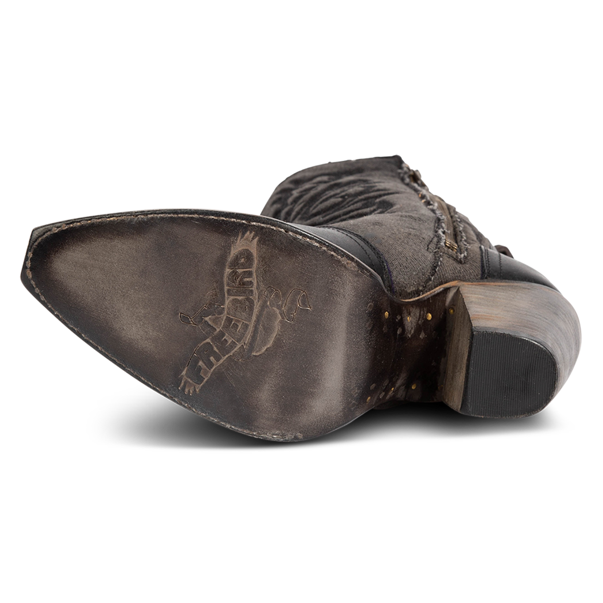 Leather sole imprinted with FREEBIRD on women's Magnolia black denim and leather boot