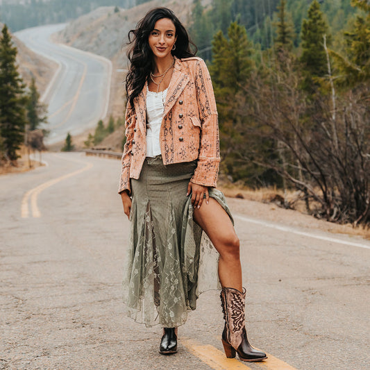 FREEBIRD women's Magnolia brown denim and leather boot with mono shaft stitching, back panel lacing and a curved pointed toe silhouette lifestyle