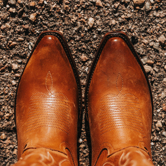 FREEBIRD men's Marshall whiskey leather western cowboy boot with shaft stitch detailing, snip toe construction and leather pull straps