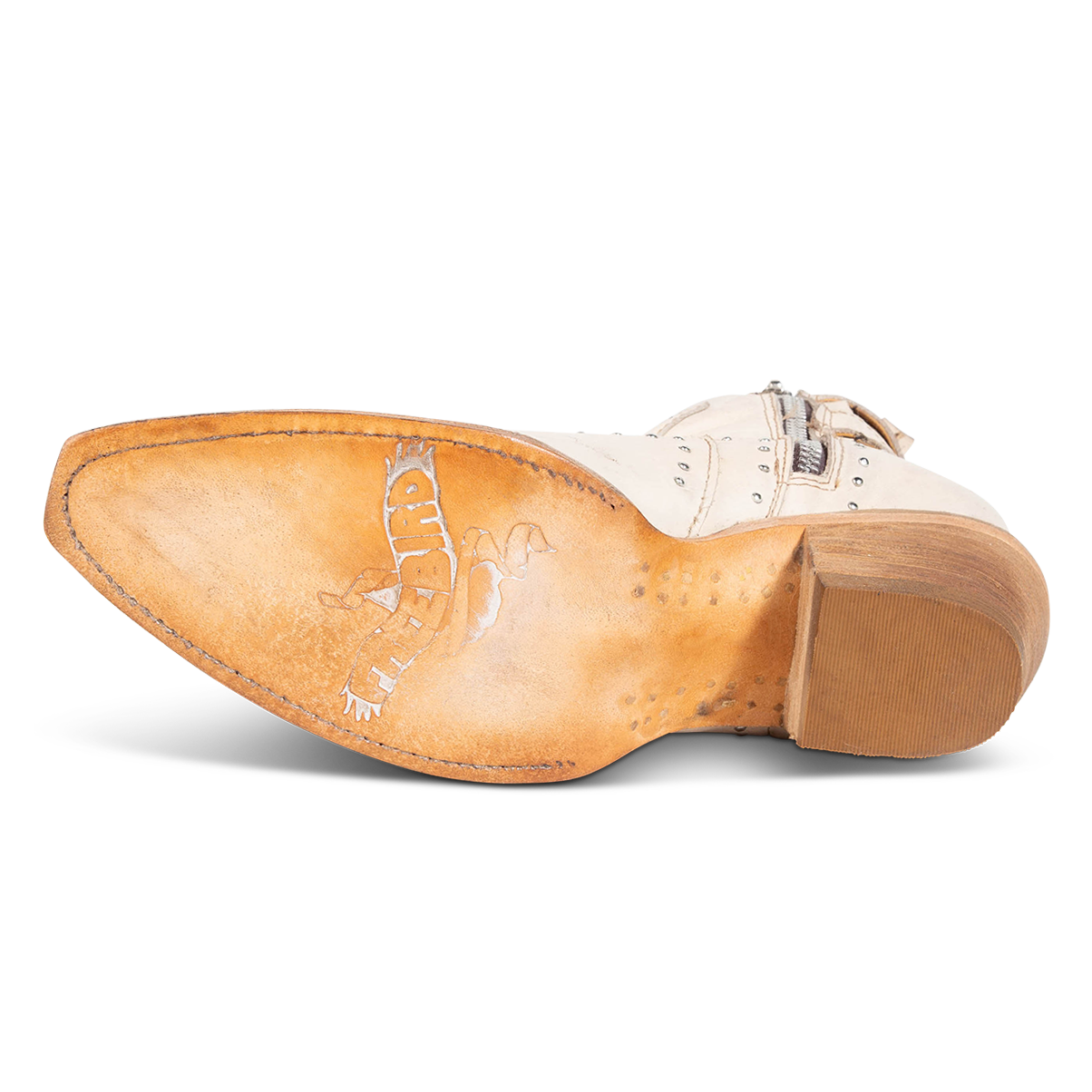 Leather sole imprinted with FREEBIRD on women's Morgan beige leather ankle bootie