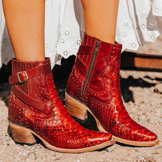 FREEBIRD women's Morgan red python leather ankle bootie with silver stud embellishments, gore detailing, and buckle straps