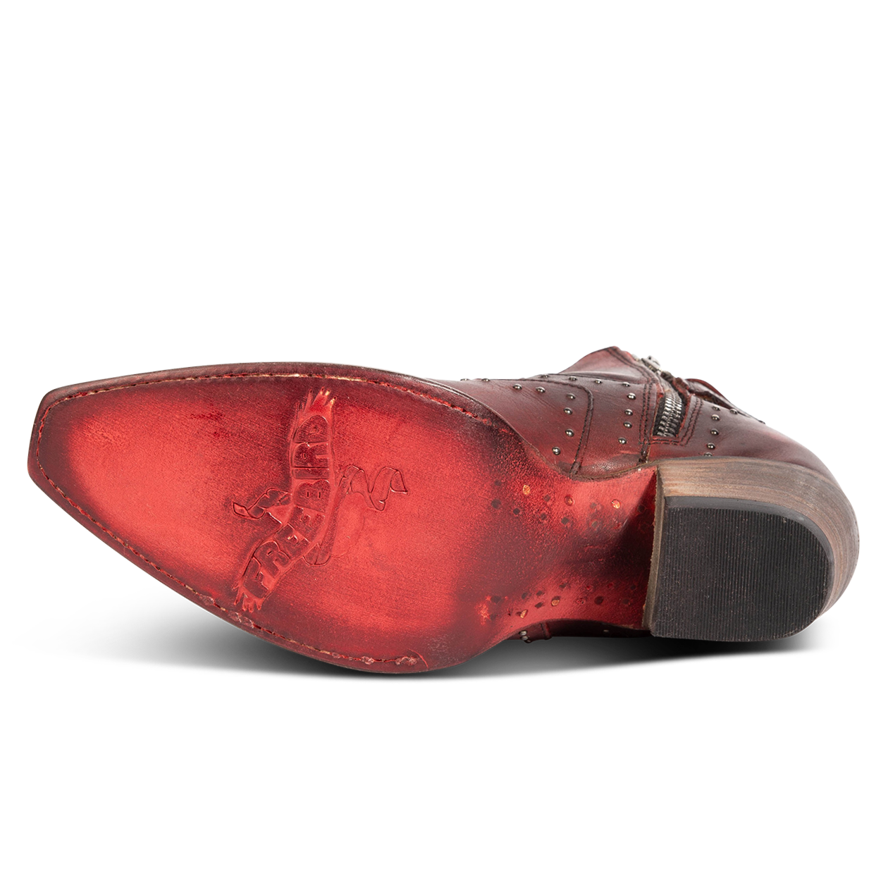 Leather sole imprinted with FREEBIRD on women's Morgan red leather ankle bootie