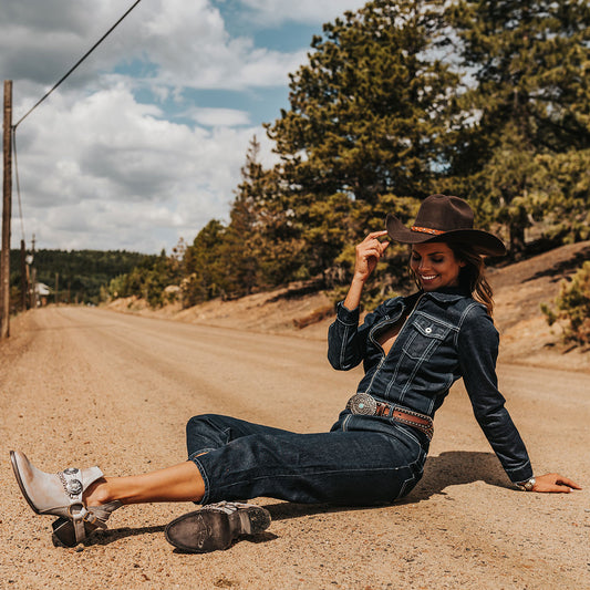 FREEBIRD women's Mystic smoke leather belted embellished bootie with ankle framing cuts lifestyle image