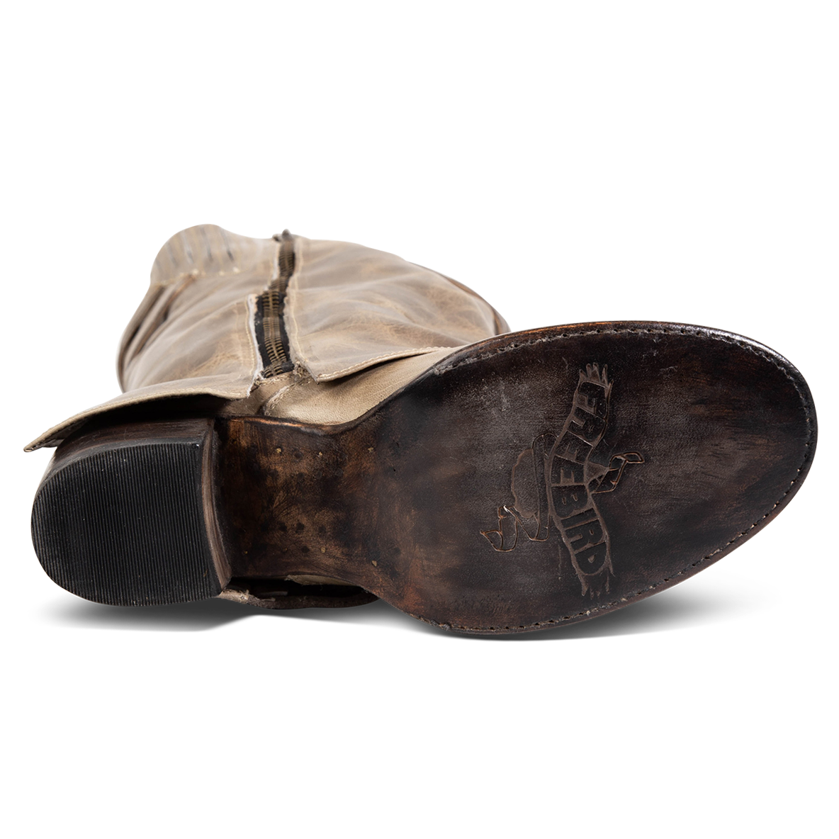 Black leather sole imprinted with FREEBIRD on women's Nighthawk stone boot