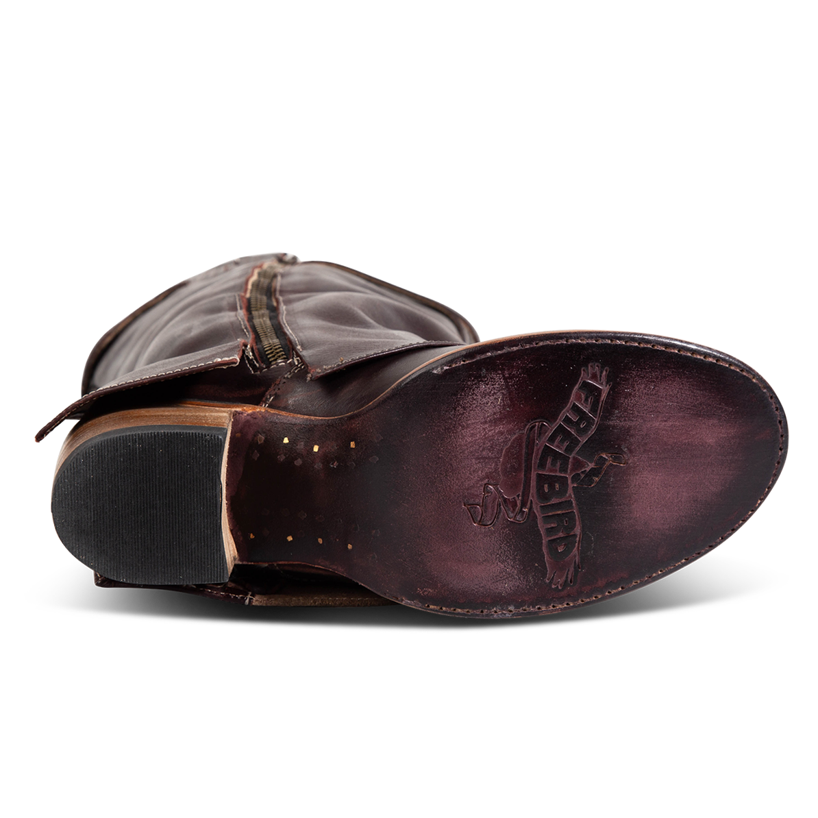 Purple leather sole imprinted with FREEBIRD on women's Nighthawk wine boot