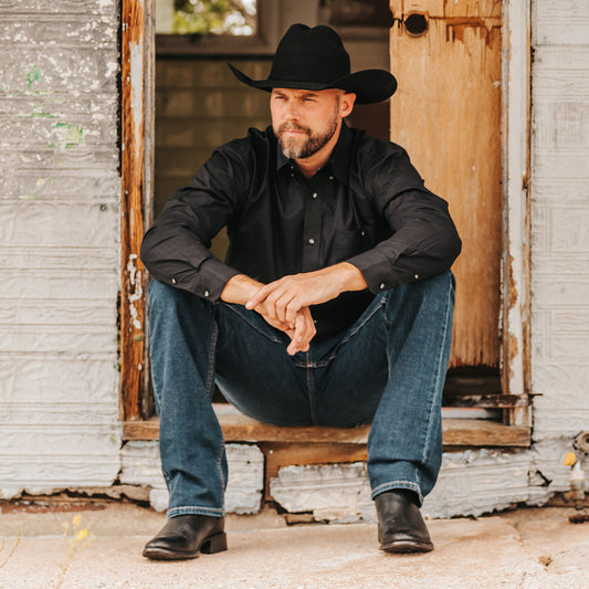 FREEBIRD men's Palmer black leather almond toe back leather pull strap ankle boot lifestyle image