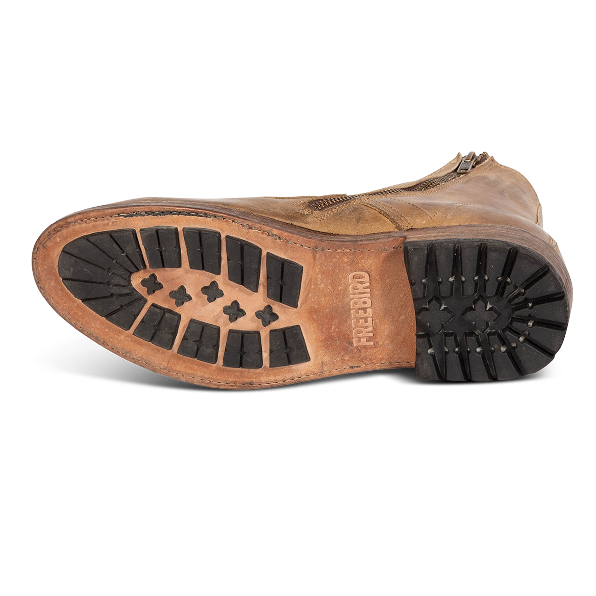 Rubber sole imprinted with FREEBIRD on Pendleton men's tan leather ankle boot