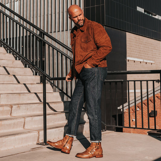 FREEBIRD men's Penn tan dress boot with brogue detailing and decorative straps lifestyle image