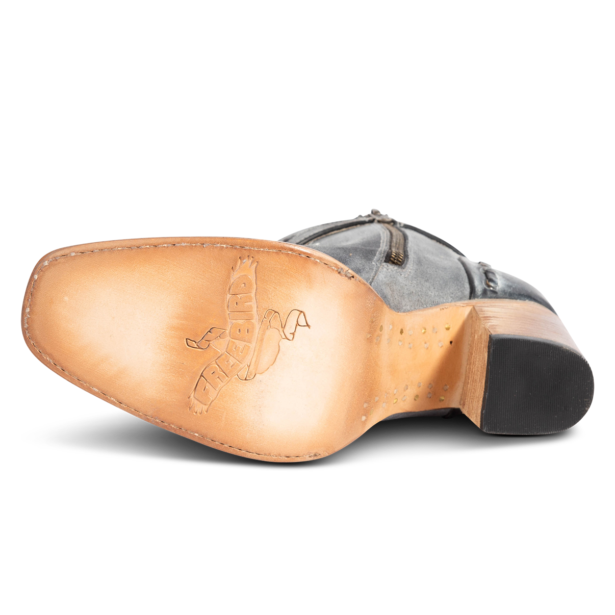 Leather sole imprinted with FREEBIRD on women's Poppy blue suede bootie