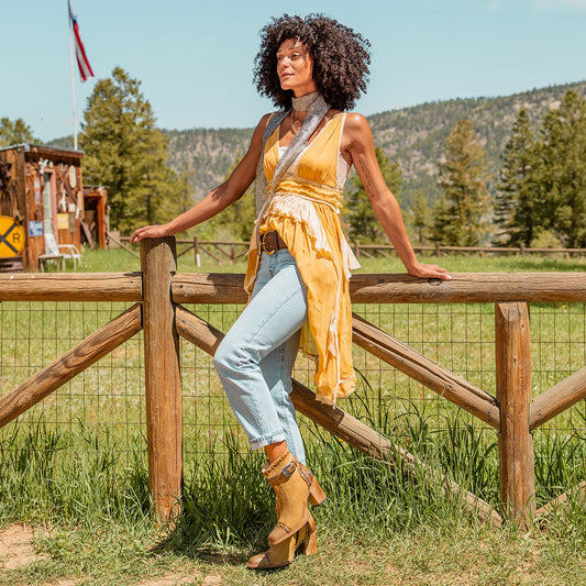 Tan suede POPPY heeled bootie with a stacked block heel, side zip closure, and distressed finish for women lifestyle